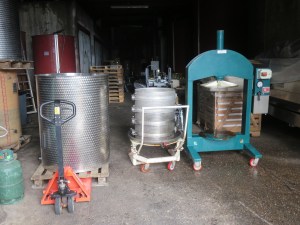 The grapes in tank, the cage and press
