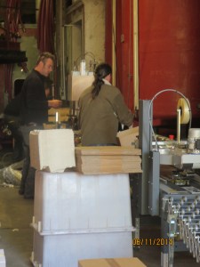 Jeff and Michel packing cases with the help of some...er.... high technology